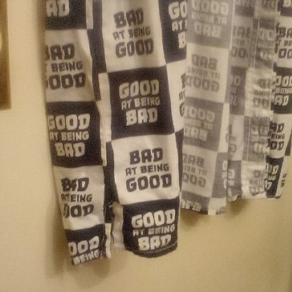 Button down tee shirt with collar and slits on eac side saying bad at being good - Picture 4 of 7